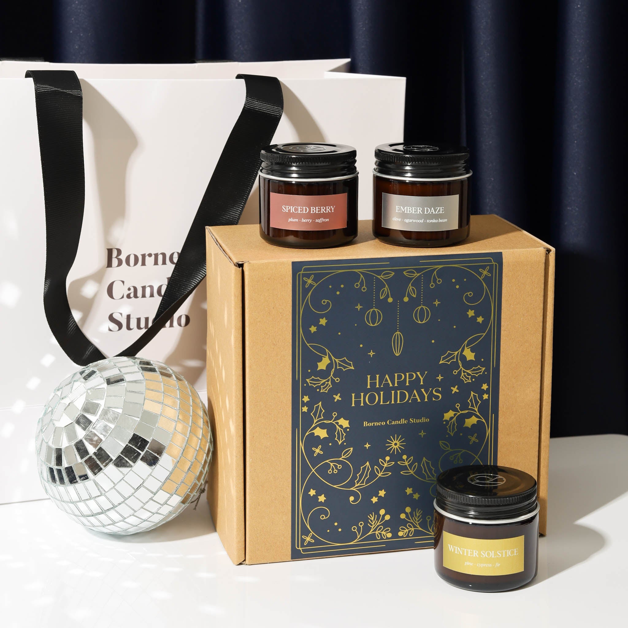 Borneo Candle Studio Brunei Holiday Gift Set 2024 with 3 scented candles in Spiced Berry, Ember Daze and Winter Solstice. There is optional of premium paper bag add on.